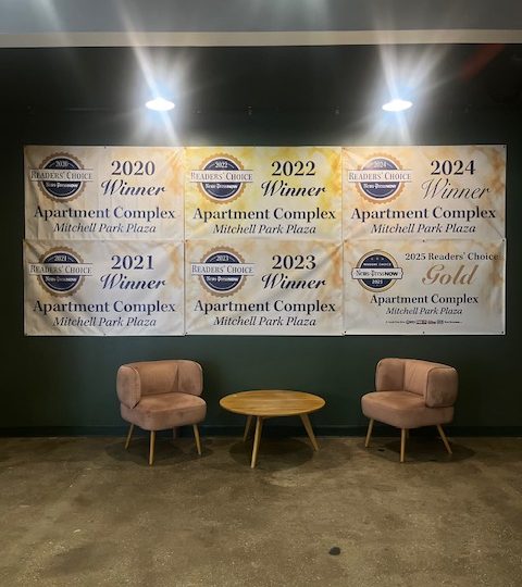 a living room filled with lots of chairs and tables