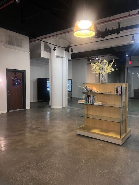 a bathroom with a sink and a light on