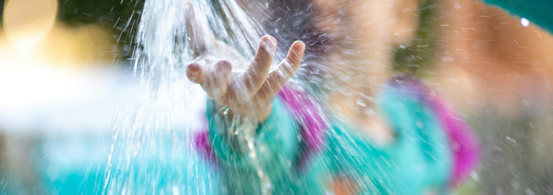 person in blue inflatable pool