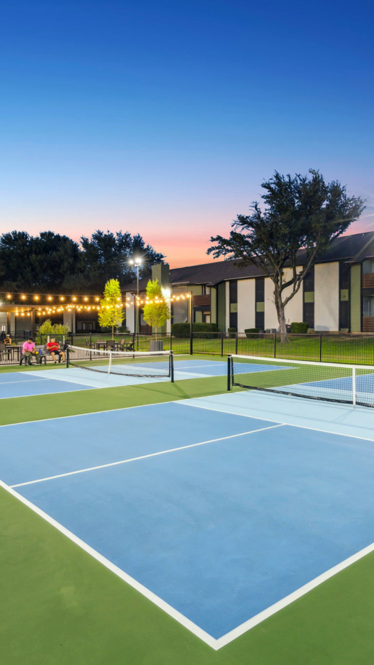 tennis courts at The  Reid Apartments