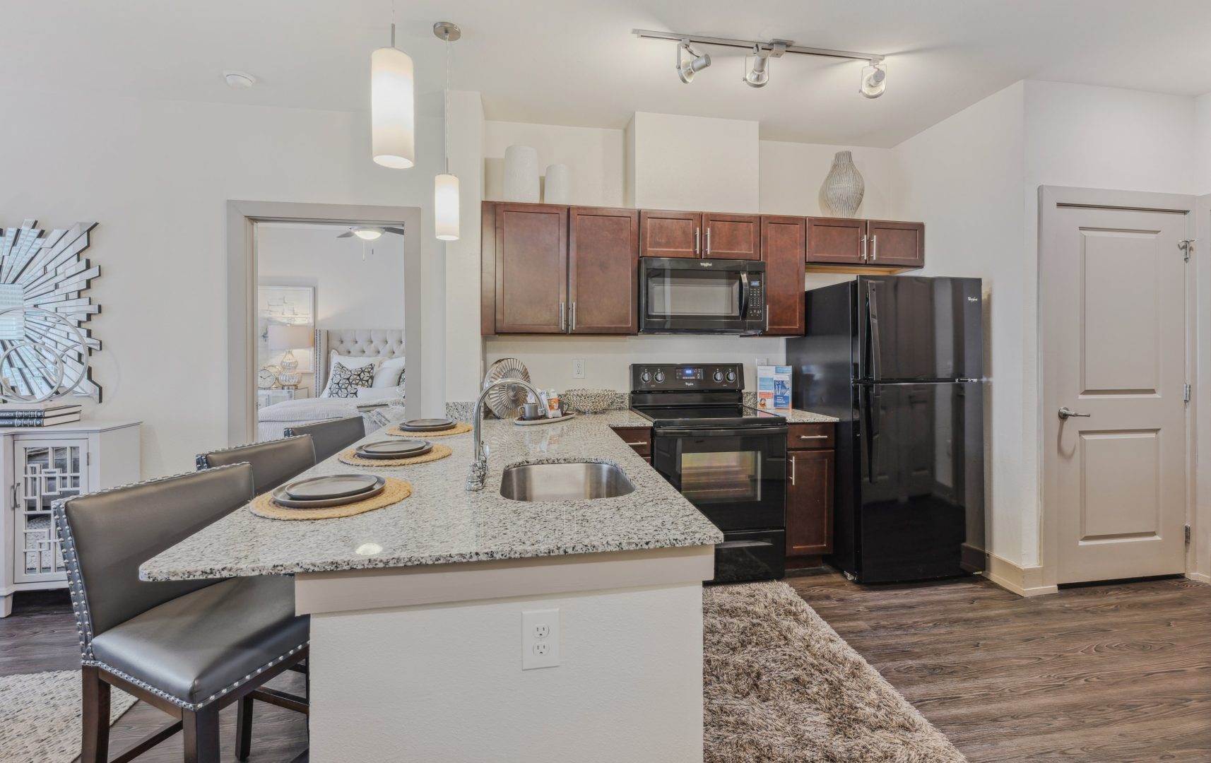 the kitchen and dining area of a new apartment at The Steelyard Apartments