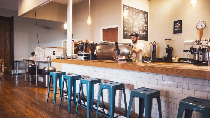 a man standing at The Discovery Park Life Apartments