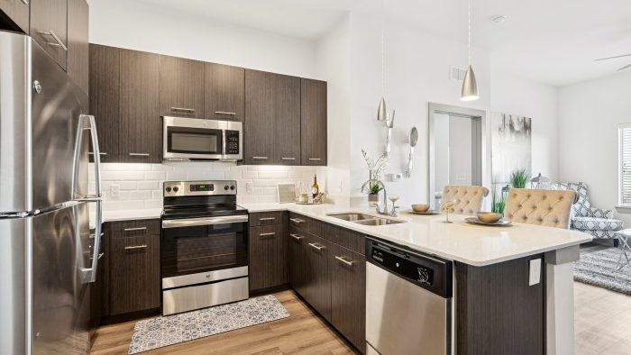 kitchen with brown cabinets and appliances