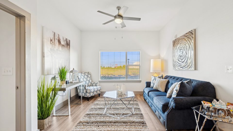 living room with couch and a chair
