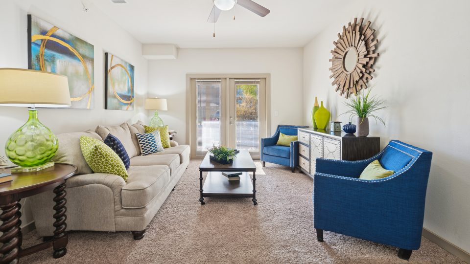 a living room filled with furniture and a couch