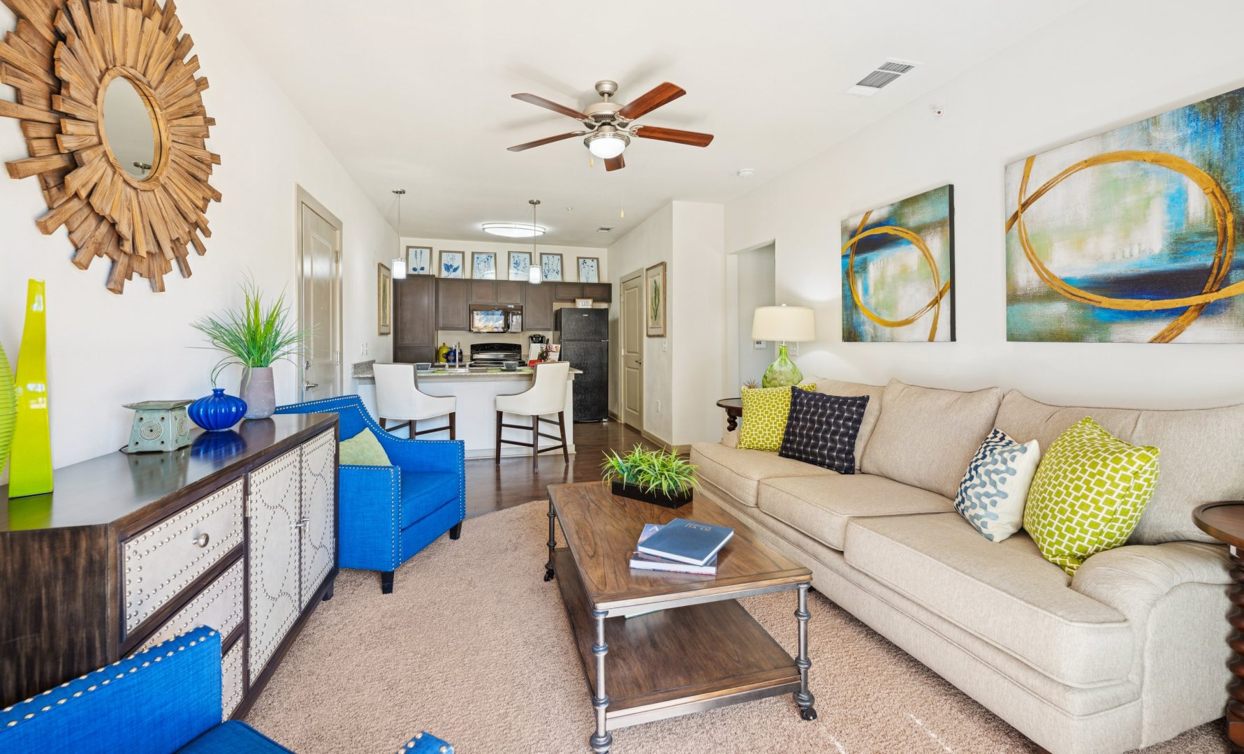 a living room filled with furniture and decor