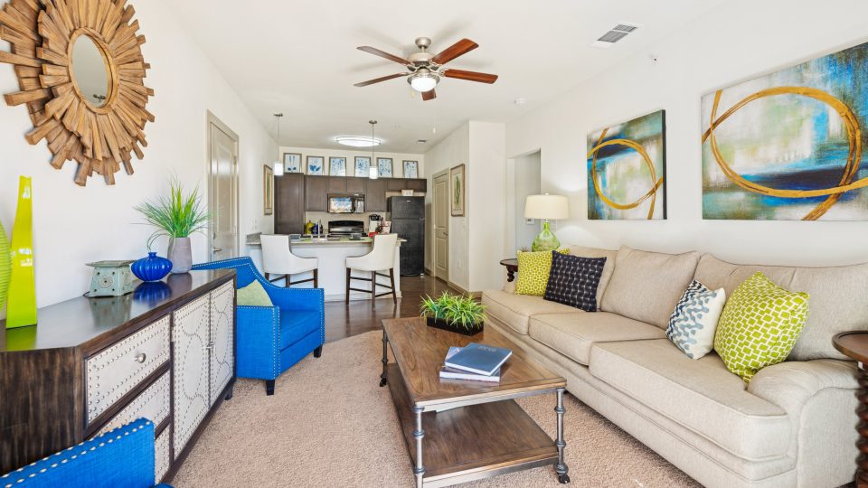 a living room filled with furniture and decor