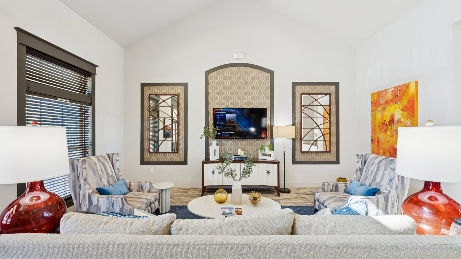 a living room filled with furniture and a couch