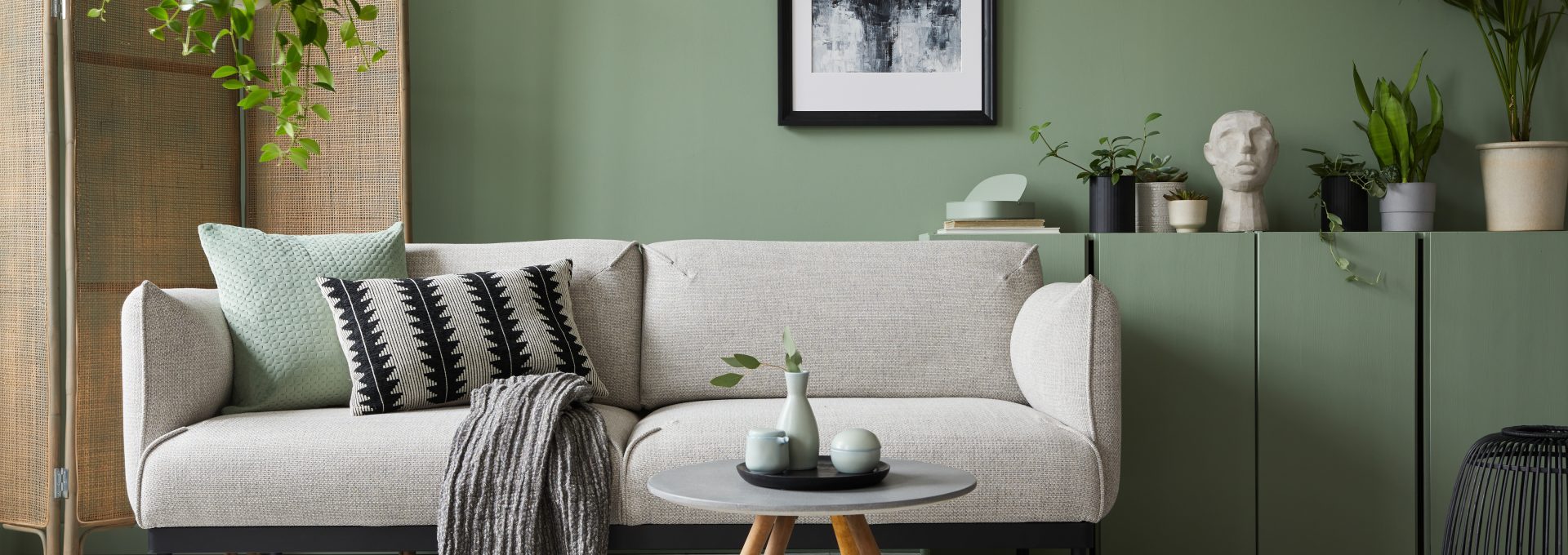 a living room with a couch and a table