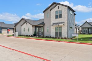 Exterior view of a new home in a residential neighborhood at The parcHAUS at Firewheel Parkway