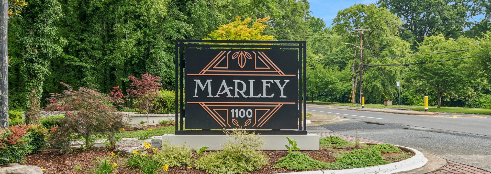 the marley sign in front of a brick building at The  Marley
