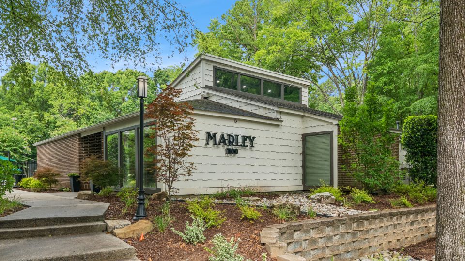 the front of a home with a sign that says peter's at The  Marley