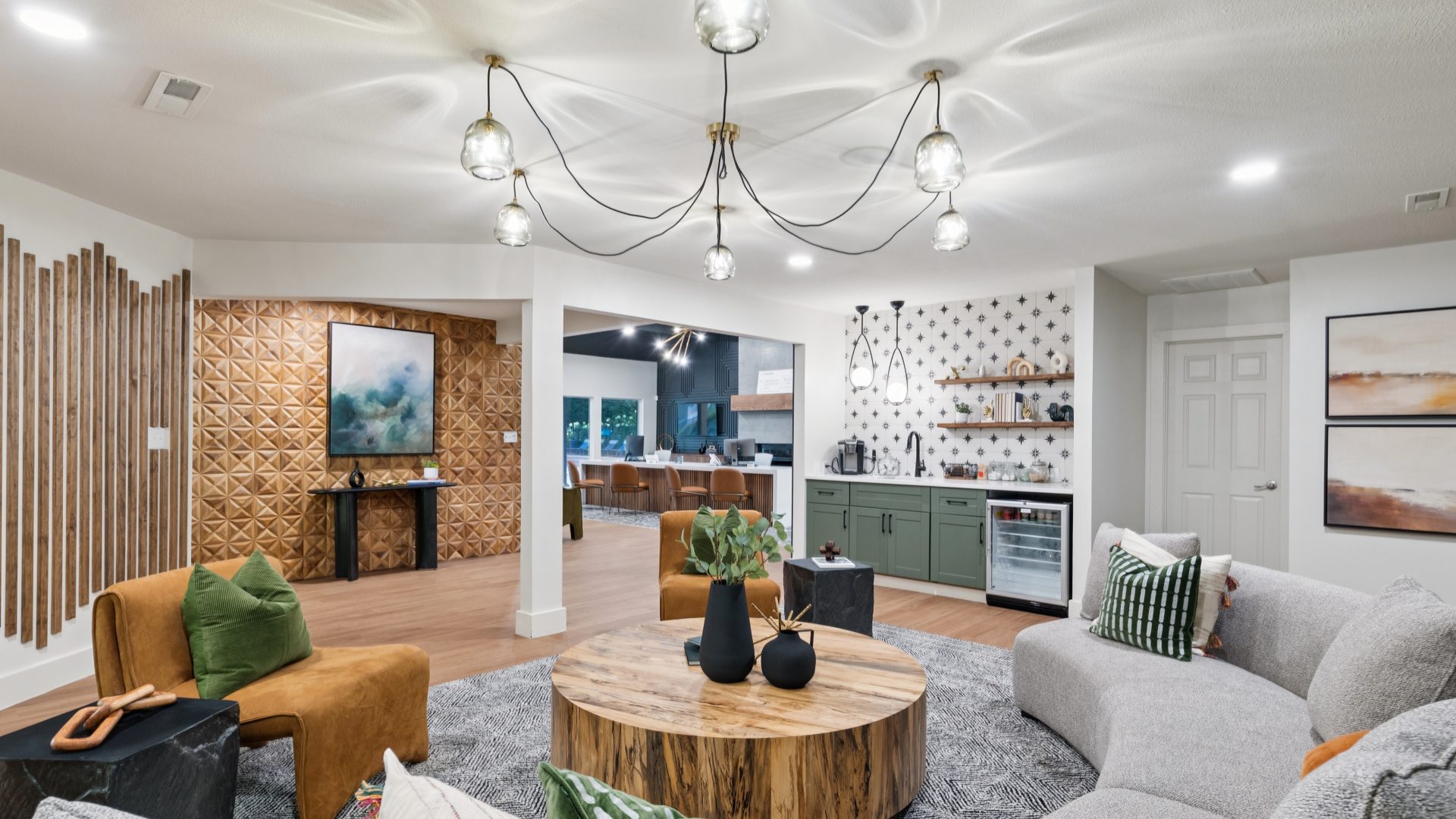 a living room with a fireplace and a coffee table at The  Marley