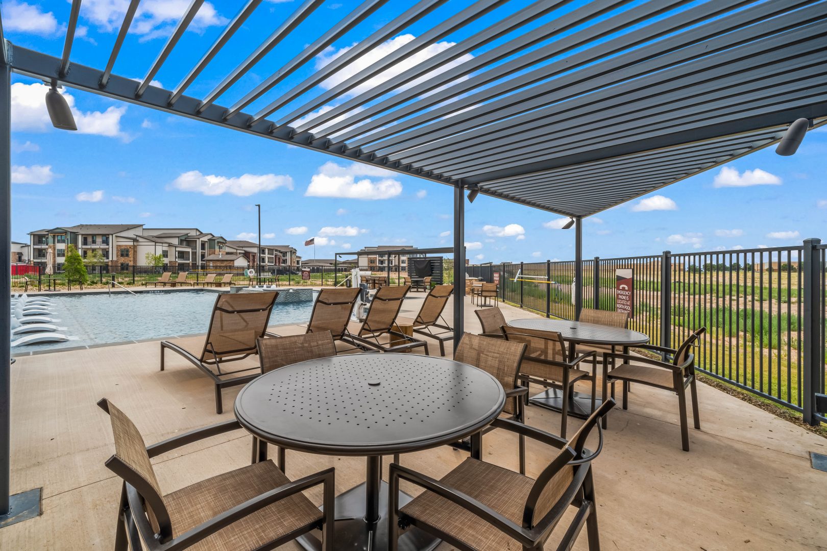 patio furniture and a pool at The La Ventana