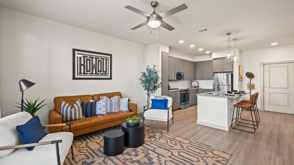 the living room and kitchen area of a new apartment at The La Ventana