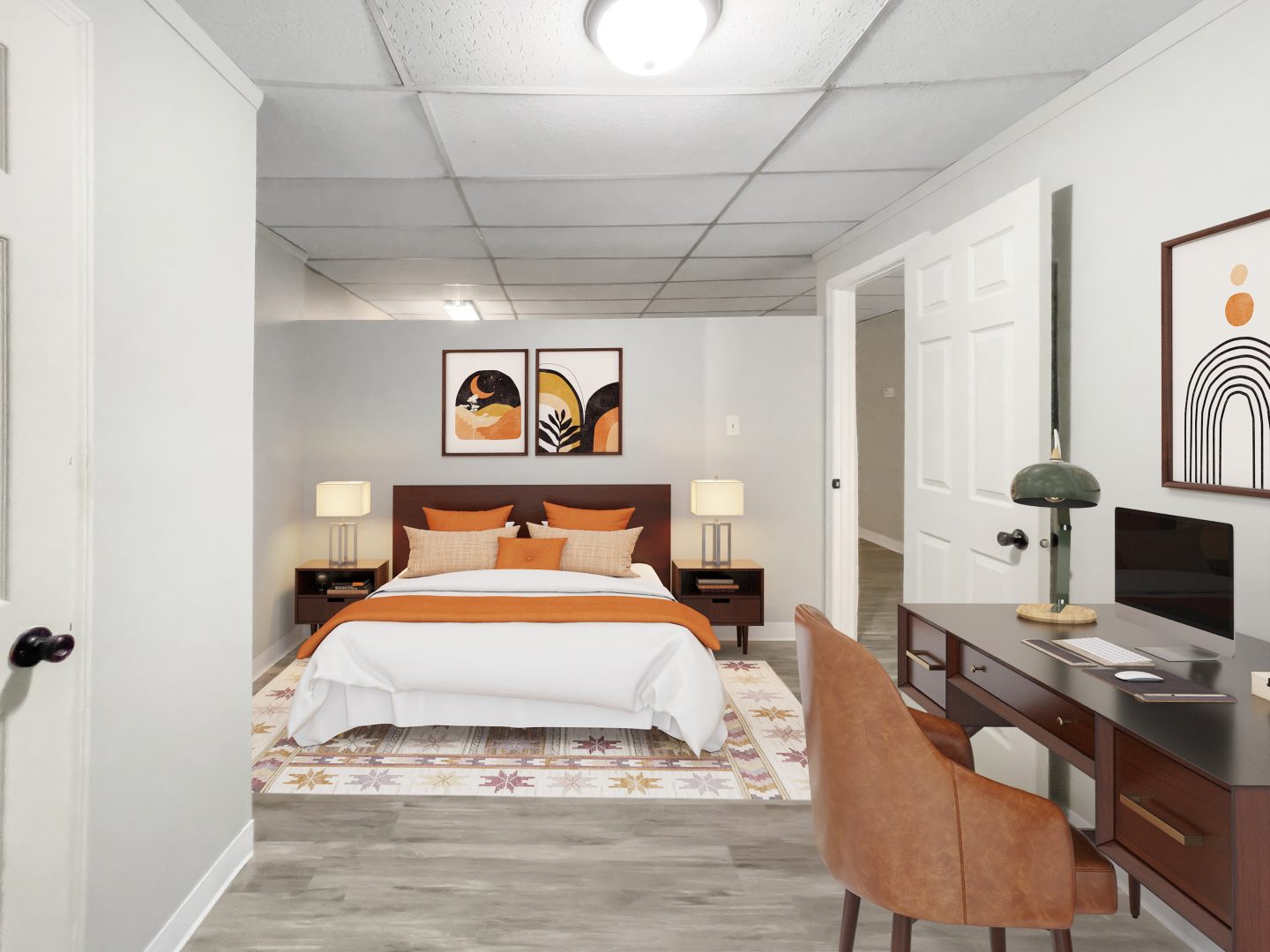 a bedroom with a bed, desk and chair at The Beacon Hill Apartments