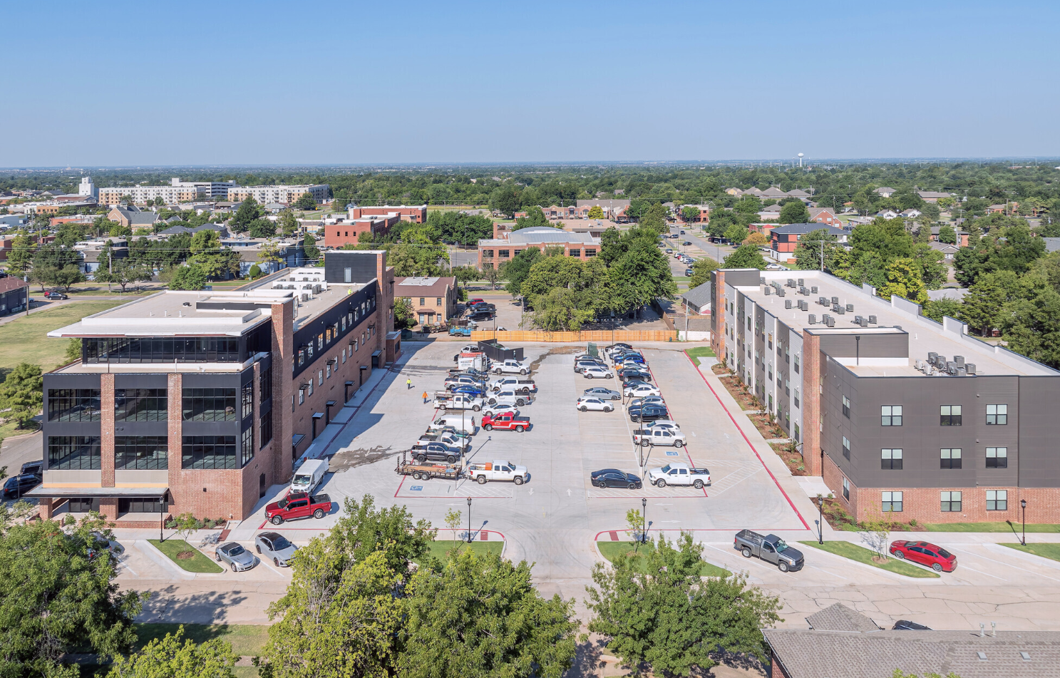 an aerial view of a parking lot and buildings at The  Campbell