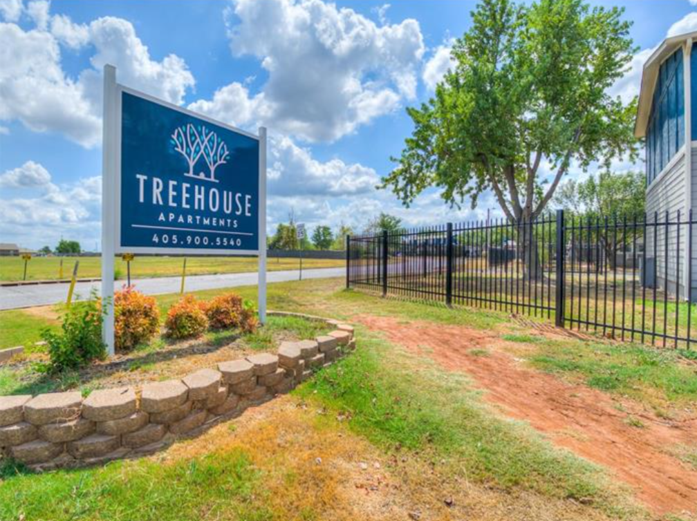 the entrance to the treehouse apartments in oklahoma at The Treehouse