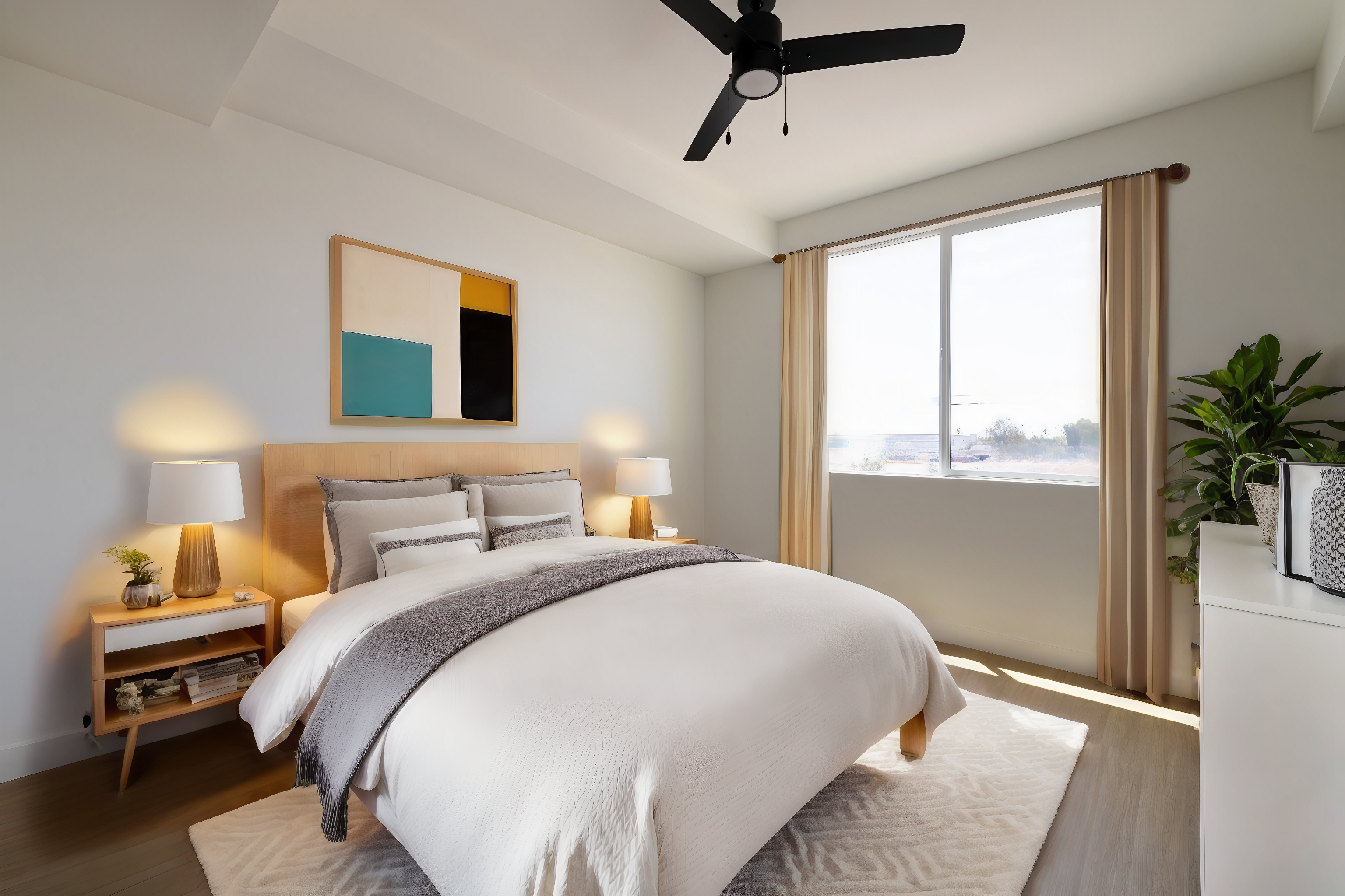 Rendering of an apartment bedroom with a ceiling fan and a bed at The Blue at Eastline