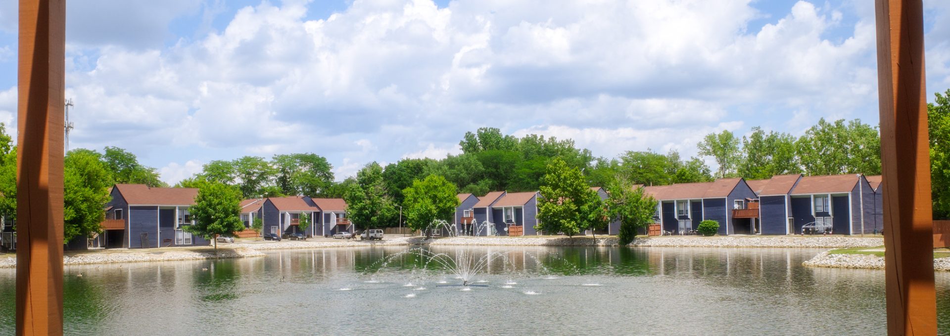 a view of the lake and cabins at The Lakeshore Cove