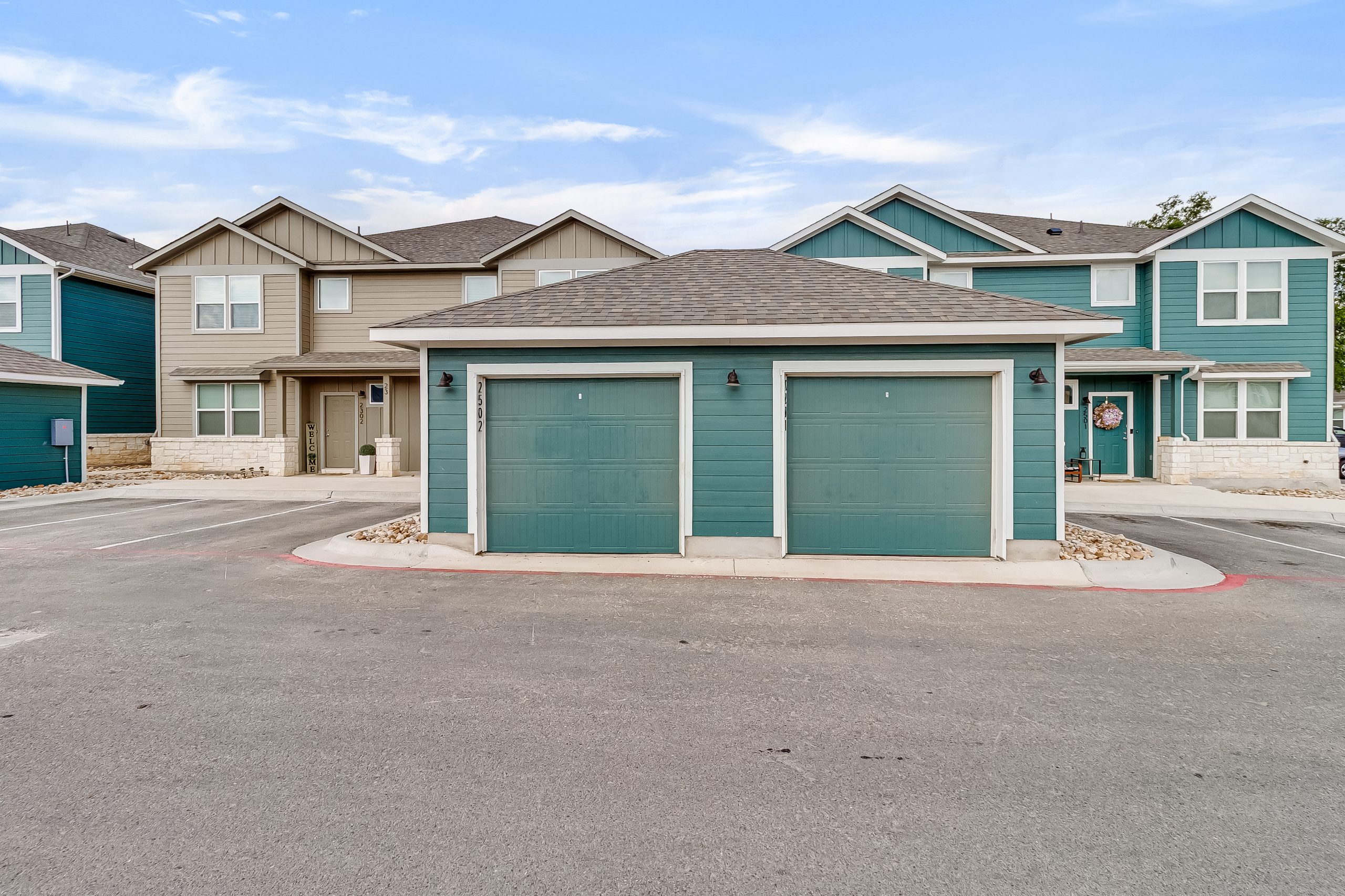 Exterior view of The Powell's townhome community and detached garages