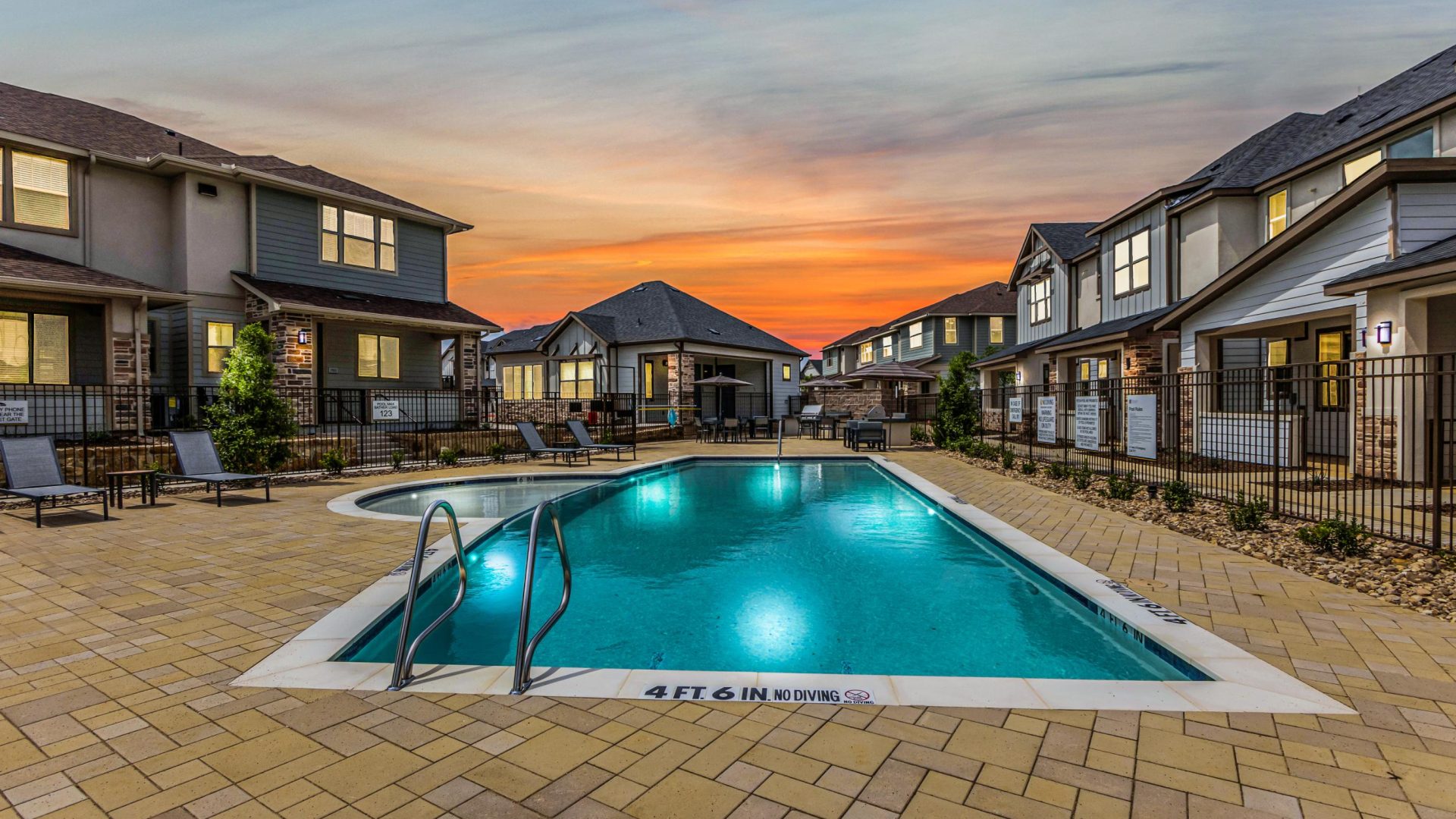 the pool at sunset at The Town Arlington