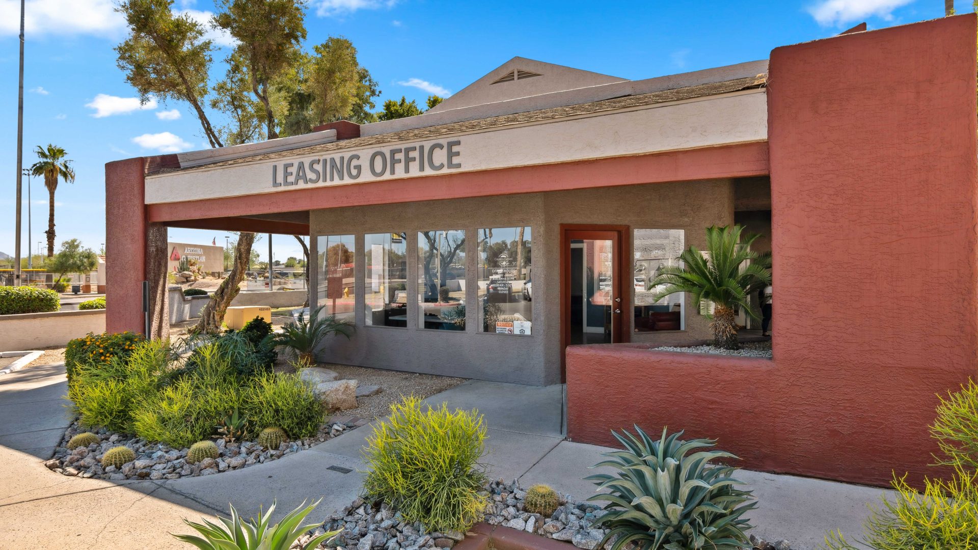 Country Gables leasing office building exterior with desert landscaping in Glendale, AZ