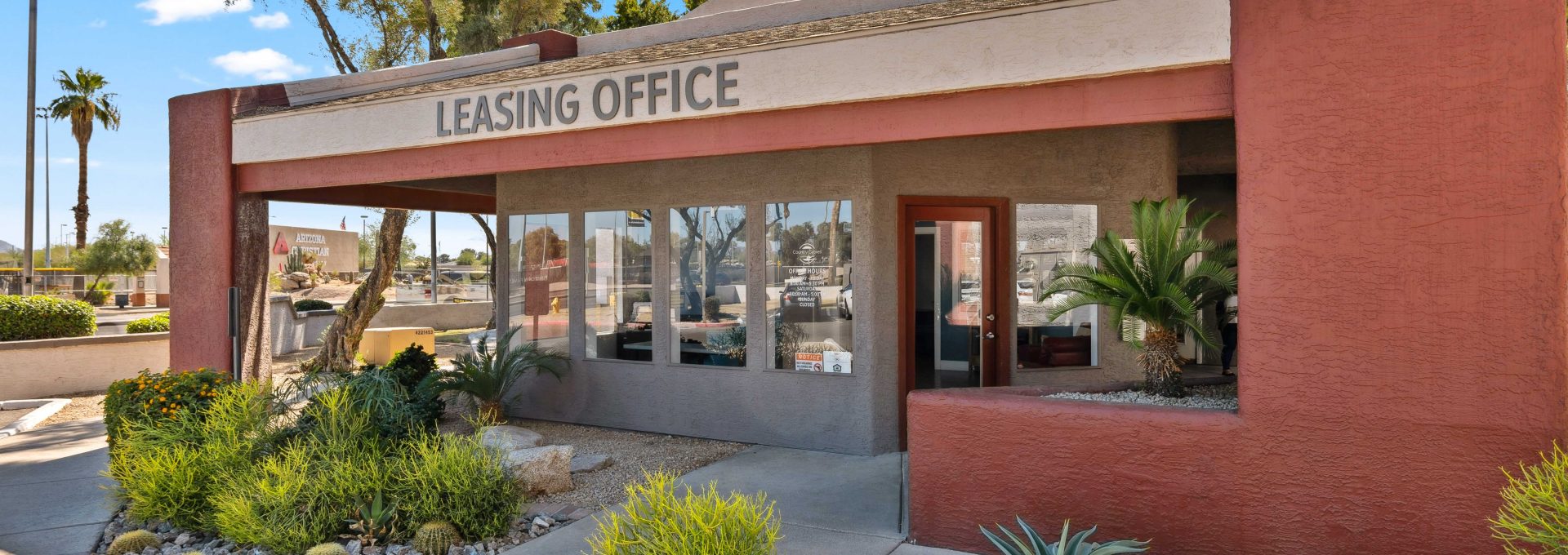 Country Gables leasing office building exterior with desert landscaping in Glendale, AZ