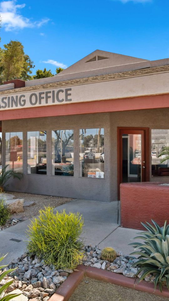 Country Gables leasing office building exterior with desert landscaping in Glendale, AZ
