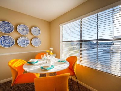 Apartment dining nook beside a window with marina views at Anchor at South Shore in League City, TX