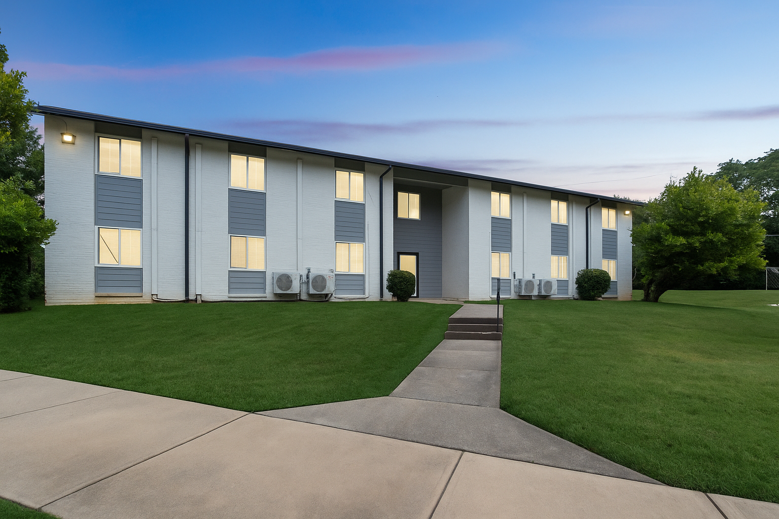 a large white building with a blue roof