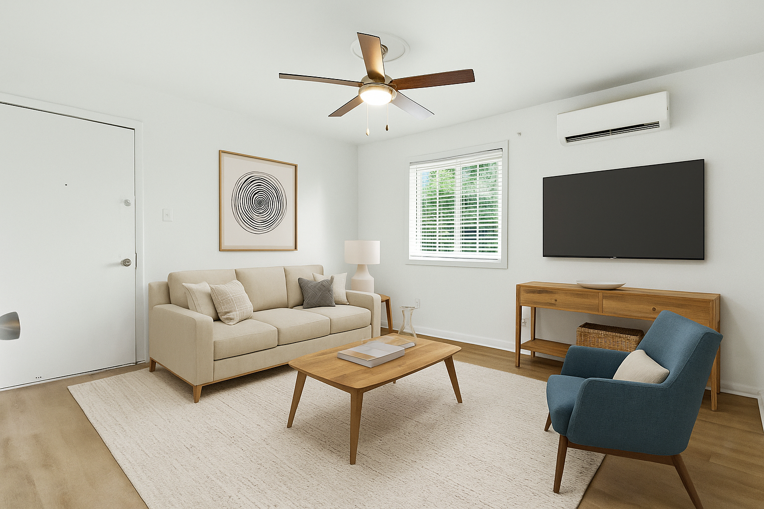 a living room filled with furniture and a large window