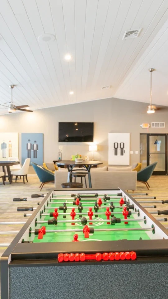 a game room with a foosball table and pool table at The Stone Ridge