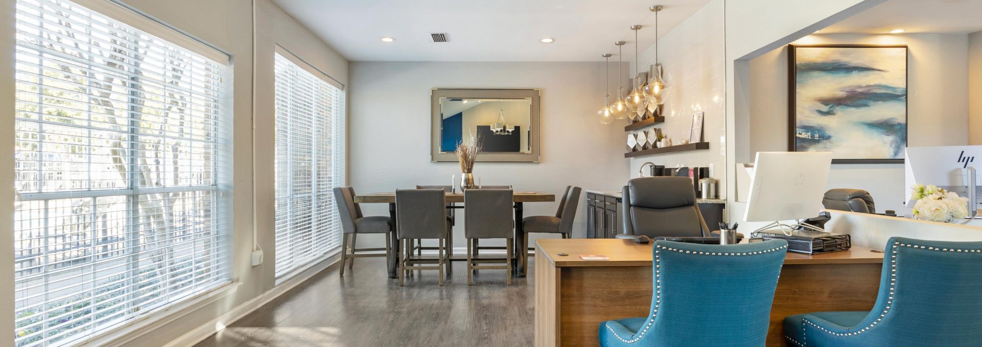 the dining room and kitchen area of a home at The  Landry