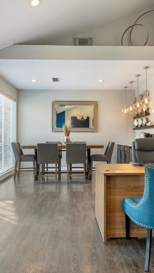 the dining room and kitchen area of a home at The  Landry