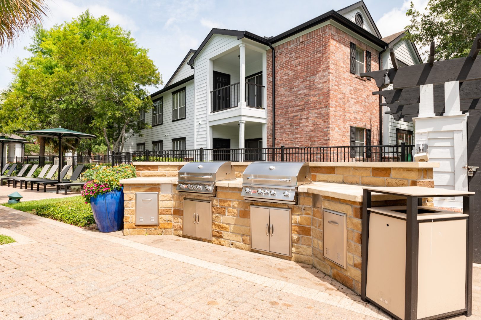 a patio with a grill and a grill at The Boulevard at Deer Park
