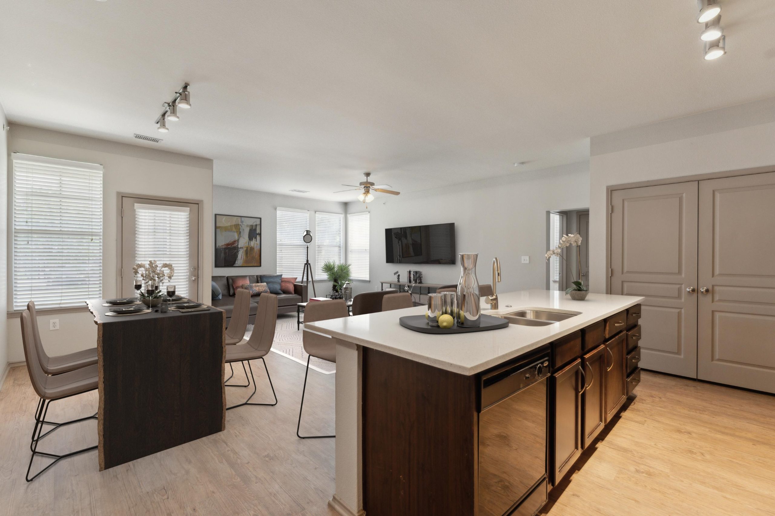 a kitchen and dining area in a large apartment at The Wyatt at Presidio Junction