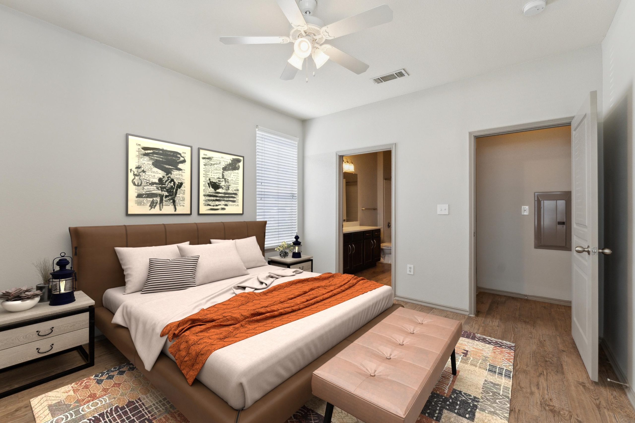 a bedroom with a bed, dresser and a fan at The Wyatt at Presidio Junction