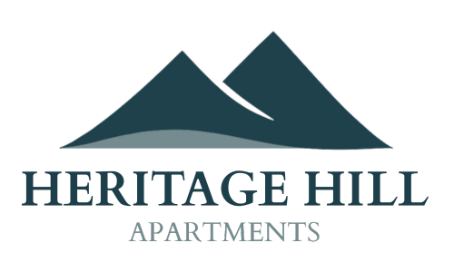 the heritage hill apartments logo at The Heritage Hill Apartments