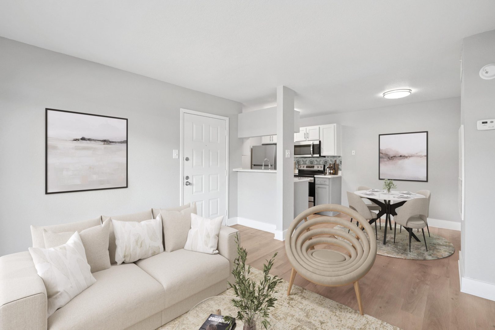 a living room filled with furniture and a fireplace