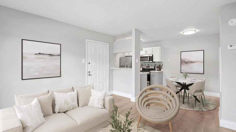 a living room filled with furniture and a fireplace