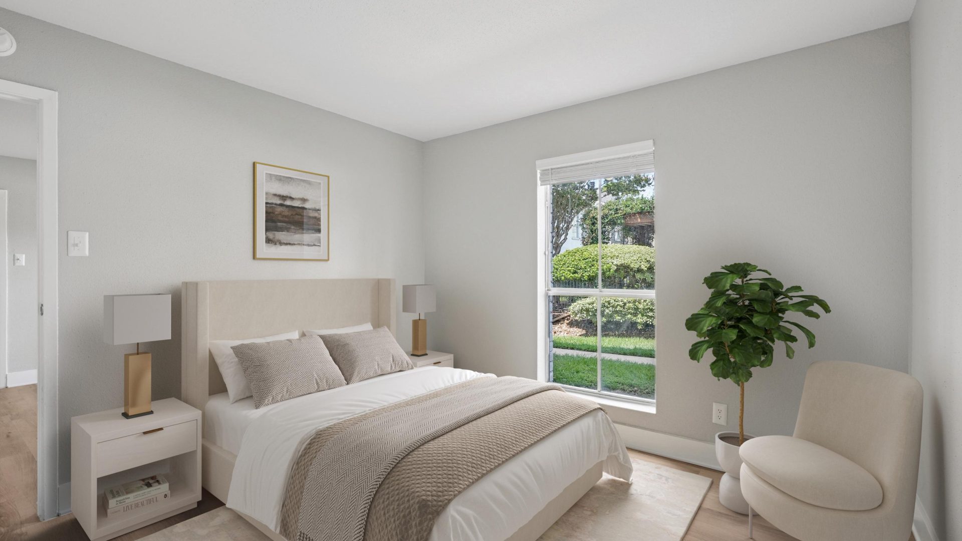 a bedroom with a large bed and a large window