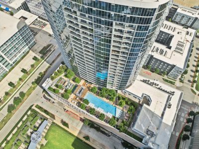 an aerial view of a high rise building with a pool at The LVL 29