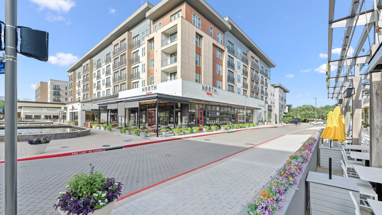 the exterior of a building with a sidewalk and street at The LVL 29