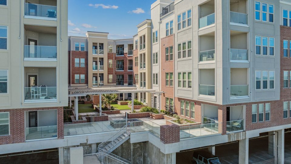 the apartment complex is located in a residential area at The Alexa