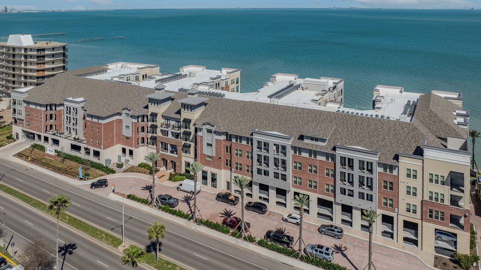 an aerial view of a beach and ocean at The Alexa