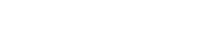 a blurry photo of a person standing in front of a wall