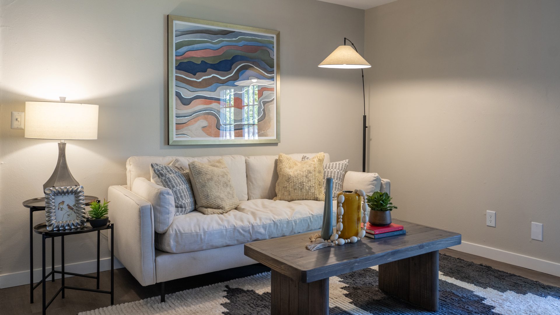a living room with a couch and a table