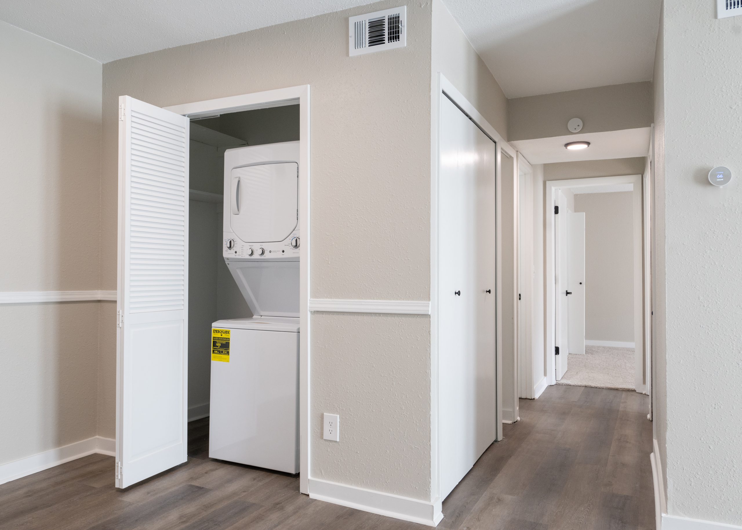 a room with a white wall and a white floor