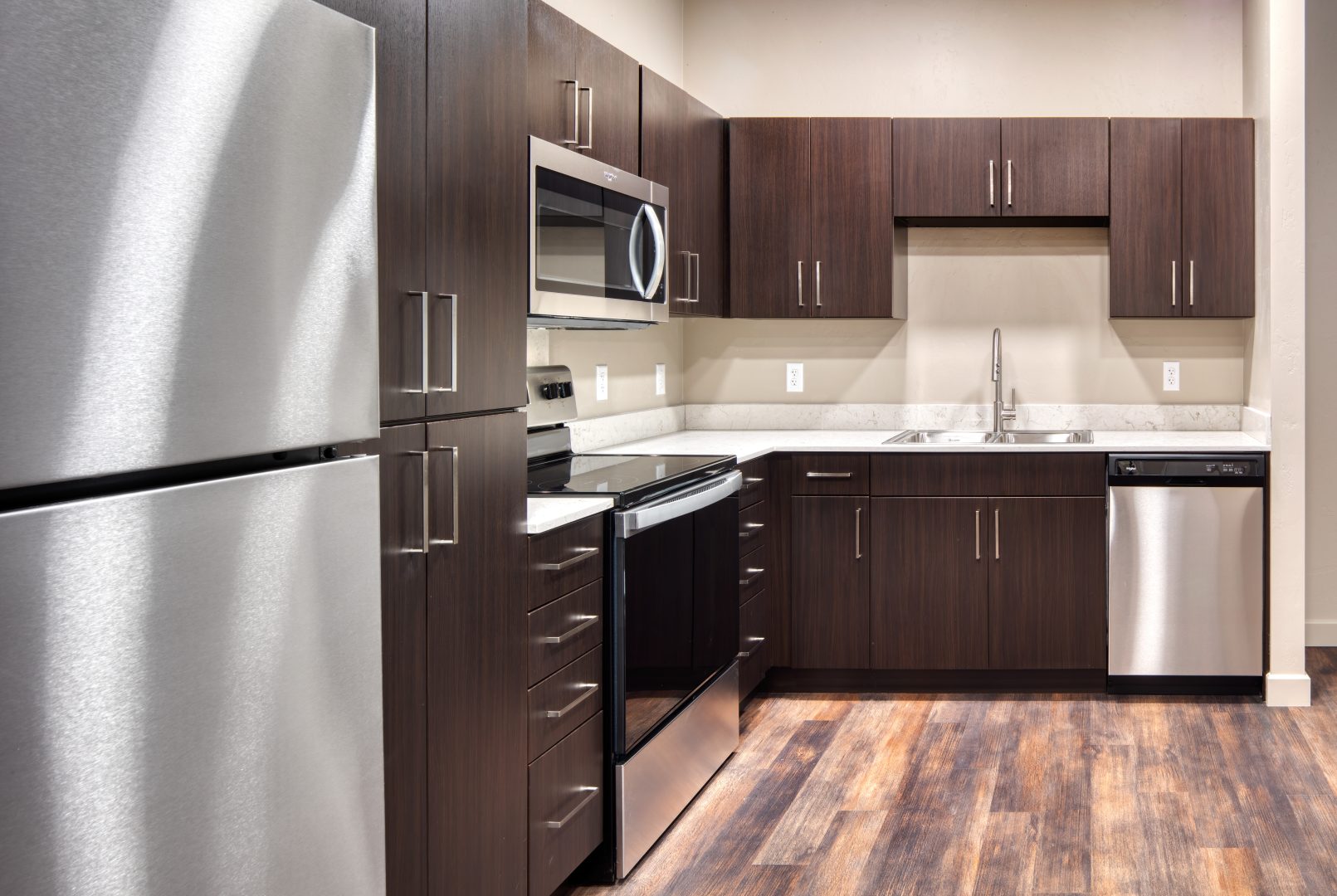 Kitchen with brown Cabinets